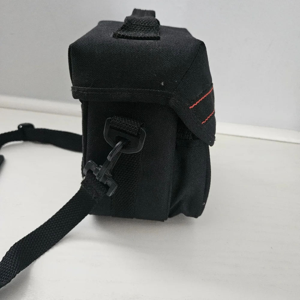 Fotima black camera carrying‎ case model no. 60C with strap and pockets